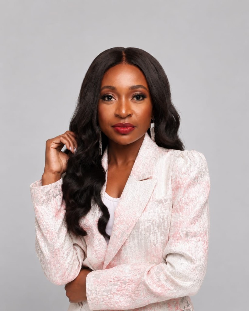 Emi Adelakun, Executive Director